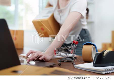 Managing online orders while carrying a package 134729739
