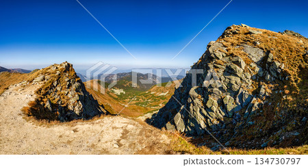 Autumn hiking trail on the ridge of Low Tatras mountains, Slovakia. Autumn hiking trail on the ridge of Low Tatras mountains, Slovakia. 134730797