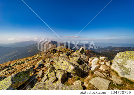 Autumn hiking trail on the ridge of Low Tatras mountains, Slovakia. Autumn hiking trail on the ridge of Low Tatras mountains, Slovakia. 134730799