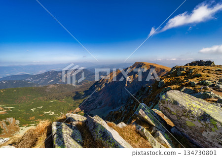 Autumn hiking trail on the ridge of Low Tatras mountains, Slovakia. Autumn hiking trail on the ridge of Low Tatras mountains, Slovakia. 134730801