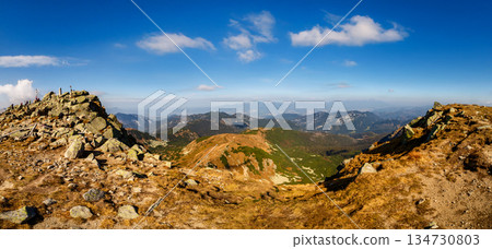 Autumn hiking trail on the ridge of Low Tatras mountains, Slovakia. Autumn hiking trail on the ridge of Low Tatras mountains, Slovakia. 134730803