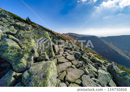 Autumn hiking trail on the ridge of Low Tatras mountains, Slovakia. Autumn hiking trail on the ridge of Low Tatras mountains, Slovakia. 134730808