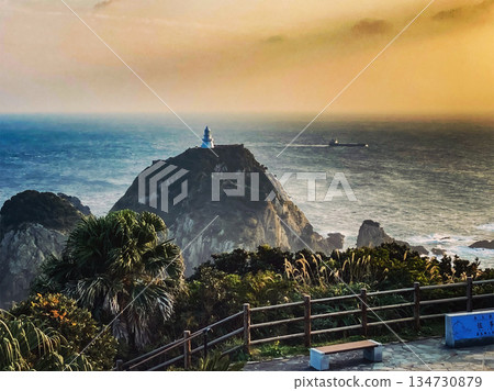 A lighthouse standing on a precipice A lighthouse standing on a precipice 134730879