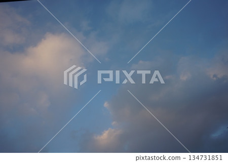 Blue sky seen through the clouds Blue sky seen through the clouds 134731851