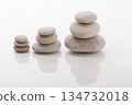 Zen Stone Stacking: Three Balanced Cairns on White Background 134732018