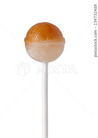 Lollipop with orange and cream caramel flavor 134732489