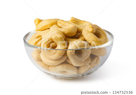 Taralli crackers in glass bowl on white background Taralli crackers in glass bowl on white background 134732536