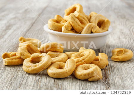 Taralli, traditional italian appetizer and savory snack 134732539