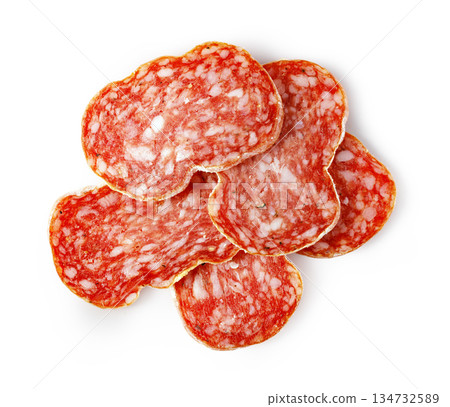 Salami slices forming appetizer on white background Salami slices forming appetizer on white background 134732589