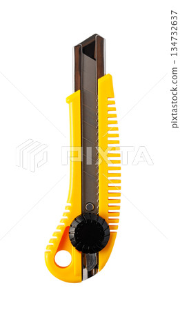 Yellow utility knife with blade extended on white background Yellow utility knife with blade extended on white background 134732637