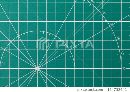 Green self-healing cutting mat surface with grid lines Green self-healing cutting mat surface with grid lines 134732641
