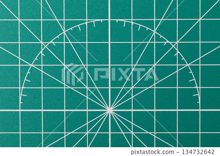 Green cutting mat with grid and protractor lines Green cutting mat with grid and protractor lines 134732642