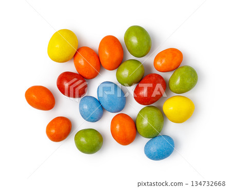Colorful chocolate candy dragees isolated on white background Colorful chocolate candy dragees isolated on white background 134732668