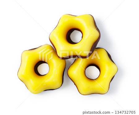 Yellow star cookies with chocolate base isolated Yellow star cookies with chocolate base isolated 134732705