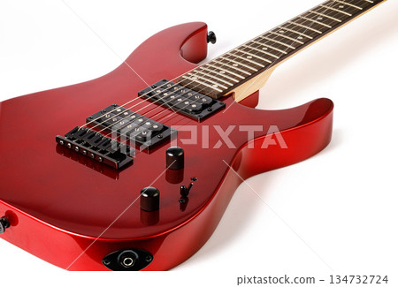 Red electric guitar isolating rock music sound Red electric guitar isolating rock music sound 134732724