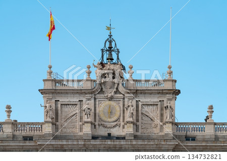 Clock and bell tower detail on the Royal Palace of Madrid facade, Spain Clock and bell tower detail on the Royal Palace of Madrid facade, Spain 134732821