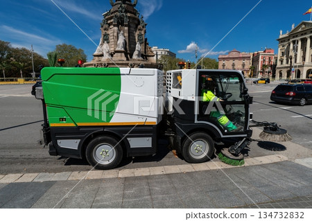 Municipal street sweeper cleaning city square on sunny day, Barcelona, Spain Municipal street sweeper cleaning city square on sunny day, Barcelona, Spain 134732832