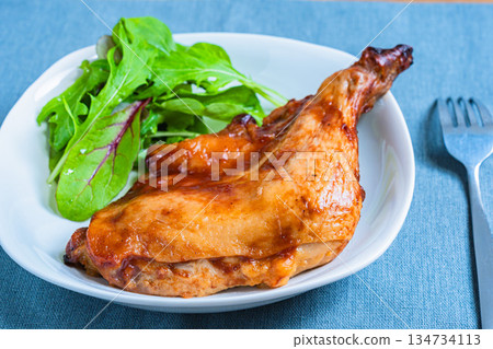 Roast chicken served on a white plate Roast chicken served on a white plate 134734113