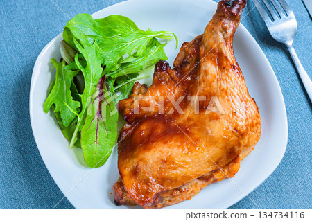 Roast chicken served on a white plate Roast chicken served on a white plate 134734116