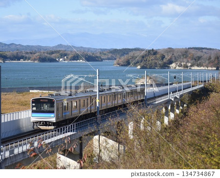 205 series Senseki Line running through Matsushima Bay 205 series Senseki Line running through Matsushima Bay 134734867