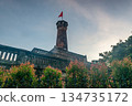 Hanoi Flag Tower with Yellow Flowers in Bloom 134735172