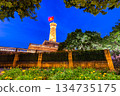 Hanoi Flag Tower with Yellow Flowers in Bloom 134735175