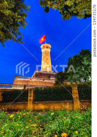 Hanoi Flag Tower with Yellow Flowers in Bloom 134735176