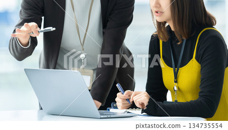 Two businessmen having a meeting Two businessmen having a meeting 134735554