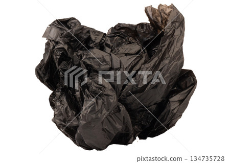 crumpled black garbage bag isolated on white background crumpled black garbage bag isolated on white background 134735728