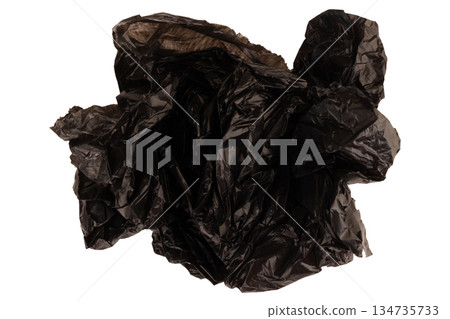 crumpled black garbage bag isolated on white background crumpled black garbage bag isolated on white background 134735733