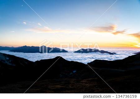 View of the Tateyama mountain range (Tsurugi-dake and the Kekatsu Sanzan mountain range) from Hakuba Sanso. Traverse of Mount Hakuba in the Northern Alps. View of the Tateyama mountain range (Tsurugi-dake and the Kekatsu Sanzan mountain range) from Hakuba Sanso. Traverse of Mount Hakuba in the Northern Alps. 134736159