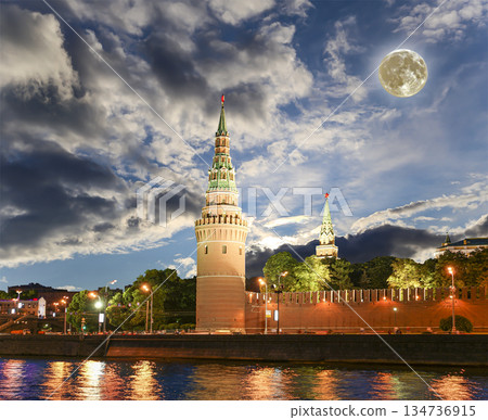 Night view of the Moskva River and Kremlin, Russia, Moscow (most popular view). Against the background of a beautiful sky with clouds, with the moon 134736915