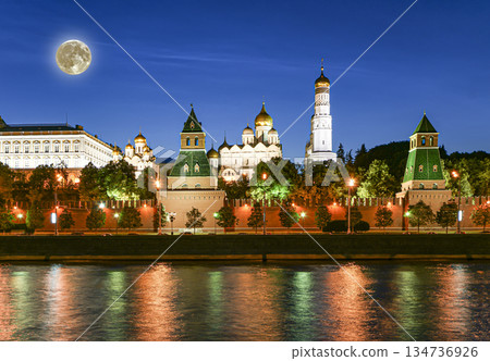 Night view of the Moskva River and Kremlin, Russia, Moscow (most popular view). Against the background of a beautiful sky with clouds, with the moon 134736926
