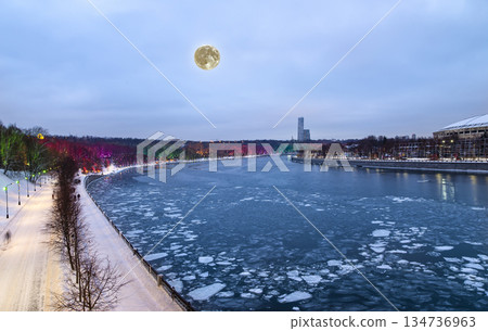 Christmas (New Year holidays) decoration in Moscow (at night, with the super moon), Russia-- Vorobyovskaya Embankment of the Moskva river and Sparrow Hills (Vorobyovy Gory) 134736963
