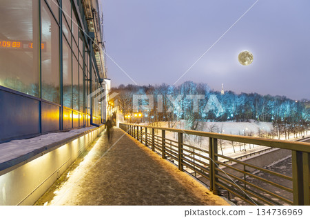 Christmas (New Year holidays) decoration in Moscow (at night, with the super moon), Russia-- Vorobyovskaya Embankment of the Moskva river and Sparrow Hills (Vorobyovy Gory) 134736969
