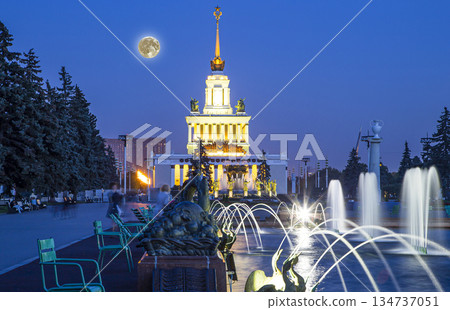 Fountain Stone Flower (with the super moon ) at VDNKh in Moscow. VDNKh (called also All-Russian Exhibition Center) is a permanent general-purpose trade show in Moscow, Russia 134737051