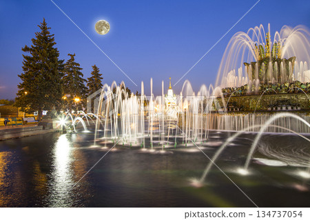 Fountain Stone Flower (with the super moon ) at VDNKh in Moscow. VDNKh (called also All-Russian Exhibition Center) is a permanent general-purpose trade show in Moscow, Russia 134737054
