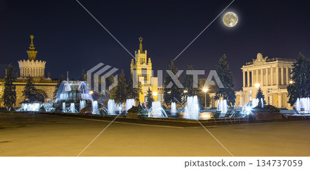 Landmarks in the territory of VDNKh (All-Russia Exhibition Centre, also called All-Russian Exhibition Center) with the super moon -- is a permanent general-purpose trade show in Moscow, Russia Landmarks in the territory of VDNKh (All-Russia Exhibition Centre, also called All-Russian Exhibition Center) with the super moon -- is a permanent general-purpose trade show in Moscow, Russia 134737059