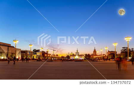 Landmarks in the territory of VDNKh (All-Russia Exhibition Centre, also called All-Russian Exhibition Center) with the super moon -- is a permanent general-purpose trade show in Moscow, Russia Landmarks in the territory of VDNKh (All-Russia Exhibition Centre, also called All-Russian Exhibition Center) with the super moon -- is a permanent general-purpose trade show in Moscow, Russia 134737072