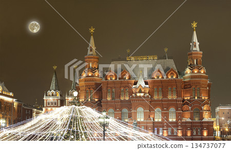 Christmas (New Year holidays) illumination and State Historical Museum (It is written in Russian) at night (with the super moon), near the Kremlin in Moscow, Russia Christmas (New Year holidays) illumination and State Historical Museum (It is written in Russian) at night (with the super moon), near the Kremlin in Moscow, Russia 134737077