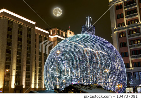 Christmas and New Year holidays illumination and Building of The State Duma of the Federal Assembly of Russian Federation (at night, with the super moon), Moscow, Russia 134737081