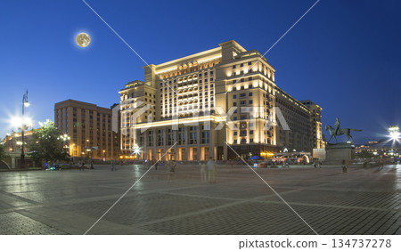 View of the eastern facade of the old Hotel Moskva from Manege Square, with the super moon. Moscow, Russia 134737278