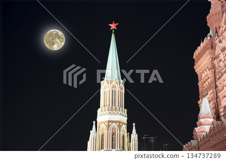 Night view of the Moscow Kremlin, Russia (the most popular view). Against the background of a beautiful sky with the moon Night view of the Moscow Kremlin, Russia (the most popular view). Against the background of a beautiful sky with the moon 134737289