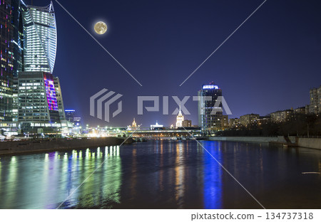 Skyscrapers International Business Center (City) at night with the super moon, Moscow, Russia Skyscrapers International Business Center (City) at night with the super moon, Moscow, Russia 134737318