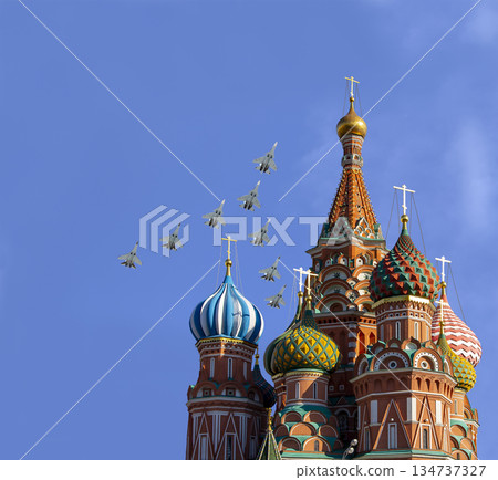 Temple of Basil the Blessed and Russian military aircraft in the sky, Air parade in honor of Victory Day celebration (WWII), Red Square, Moscow, Russia Temple of Basil the Blessed and Russian military aircraft in the sky, Air parade in honor of Victory Day celebration (WWII), Red Square, Moscow, Russia 134737327