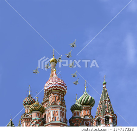 Temple of Basil the Blessed and Russian military aircraft in the sky, Air parade in honor of Victory Day celebration (WWII), Red Square, Moscow, Russia Temple of Basil the Blessed and Russian military aircraft in the sky, Air parade in honor of Victory Day celebration (WWII), Red Square, Moscow, Russia 134737328