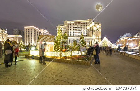 Christmas (New Year holidays) decoration in Moscow (at night) with the super moon, Russia-- Manege Square near the Kremlin 134737354