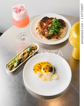 Simple brunch presentation, Casual homemade brunch with fresh herbs Simple brunch presentation, Casual homemade brunch with fresh herbs 134739807