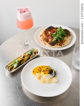 Elegant food presentation, Modern plate styling with vibrant ingredients Elegant food presentation, Modern plate styling with vibrant ingredients 134739820