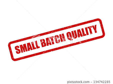 Vintage style rubber stamp displaying Small Batch Quality text, conveying superior craftsmanship and limited production standards for product assurance 134742285